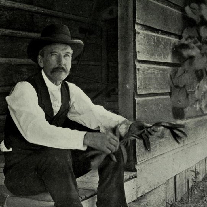 Luther Burbank on the Steps of his Cabin